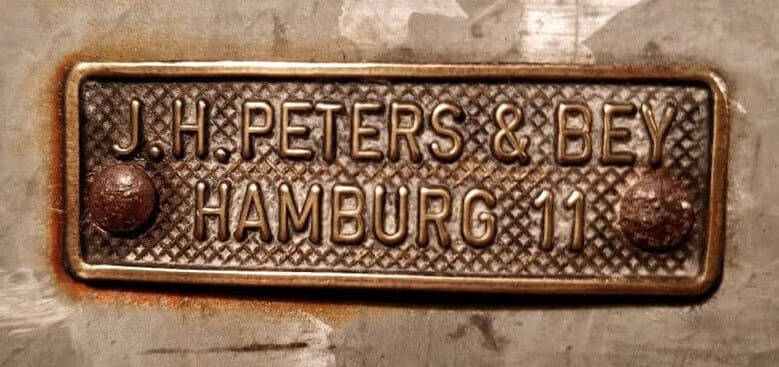 J.H. Peters & Bey scheepslamp logo Hamburg